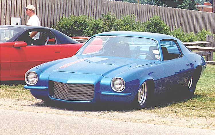 This early 70s Camaro was shaved lowered and smoothed